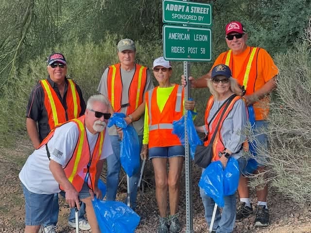 ALR Adopt a Street cleanup crew at Post 58 sign